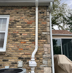 Radon system on brick home