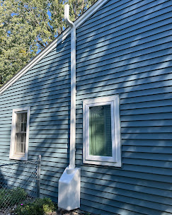 Exterior radon system blue siding